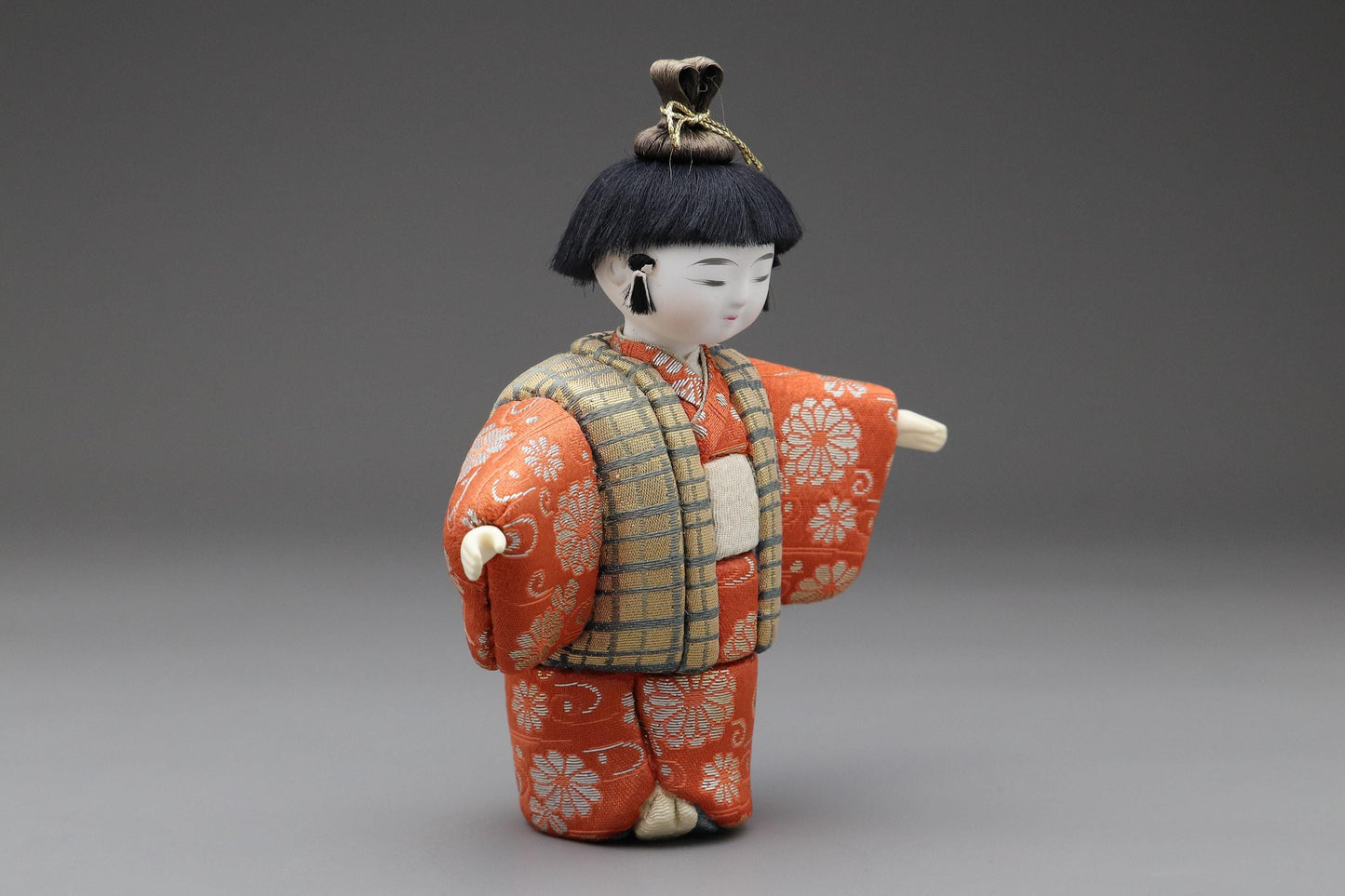 Japanese Kimekomi Boy Doll in Red Floral Kimono With Gold Check Vest – Handmade Traditional Figurine for Home Display or Cultural Art Decor