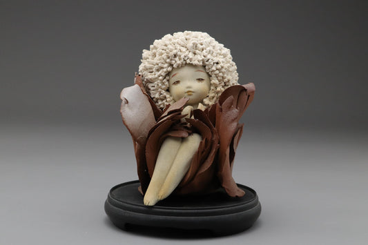 Ceramic Art Doll by Shoko Takeuchi Handcrafted Figurine With Curly Hair in Abstract Floral Form for Artistic Display or Interior Decoration