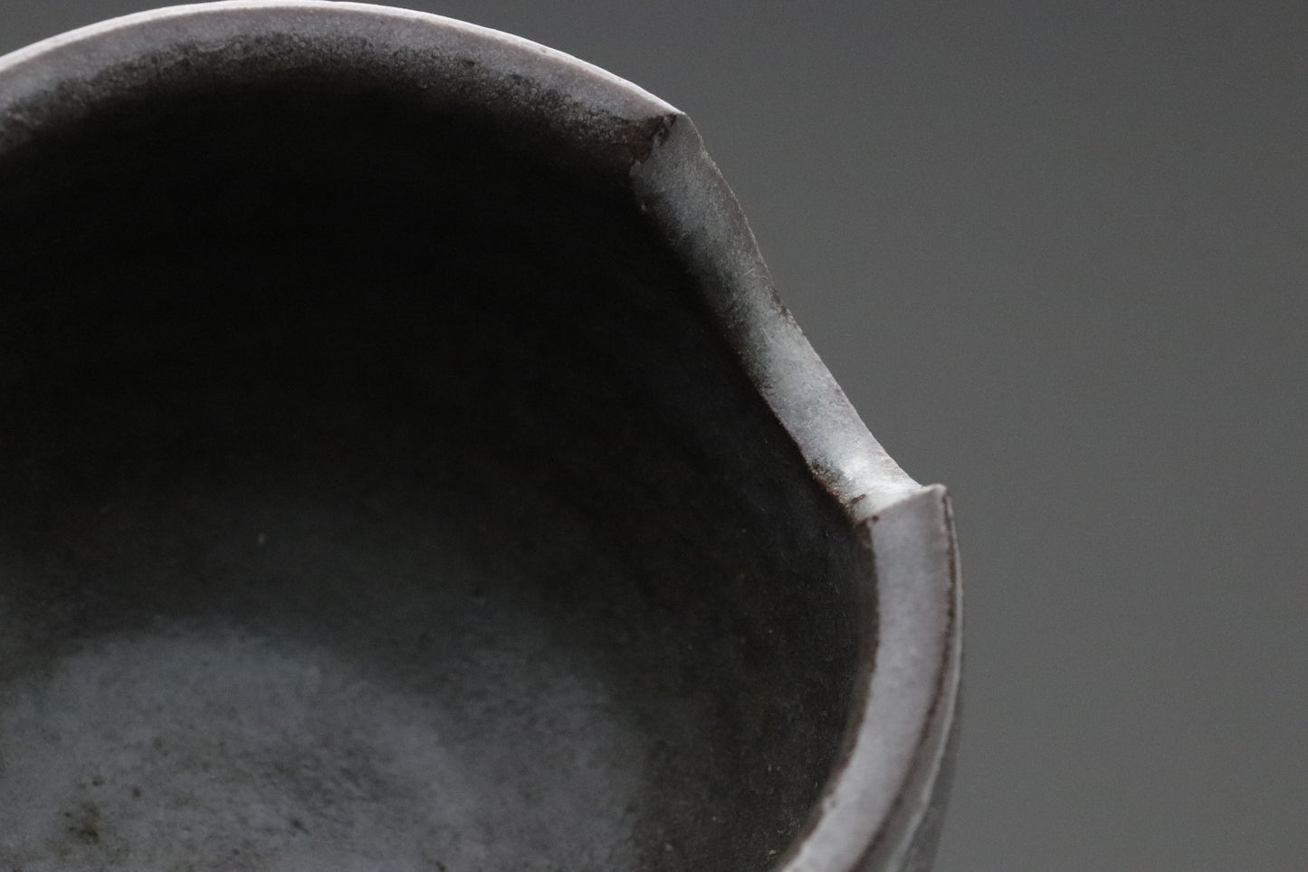 Japanese Pottery | Tea Bowl | Wabi Sabi | Minimalist Art | Dark Gray | Scalloped Rim | Hand Thrown | Ceramic Art | Zen Decor | Unique Shape