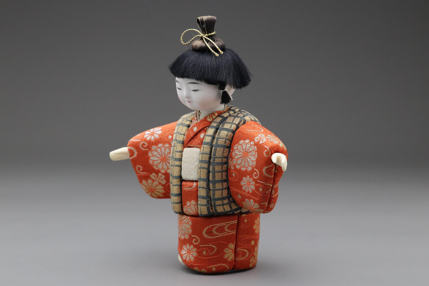 Japanese Kimekomi Boy Doll in Red Floral Kimono With Gold Check Vest – Handmade Traditional Figurine for Home Display or Cultural Art Decor